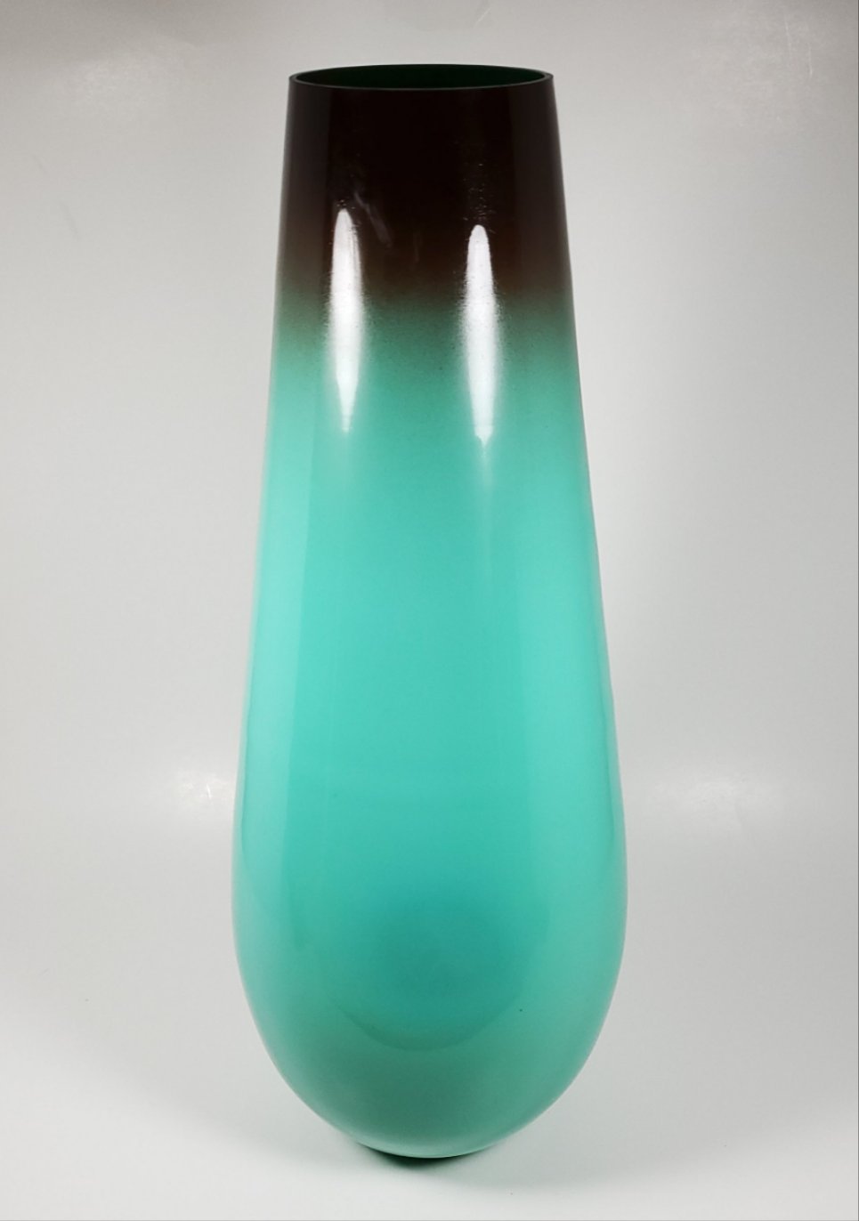 Aqua green and brown glass vase close front view