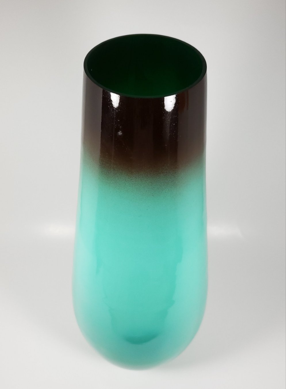 Aqua green and brown glass vase angled front view