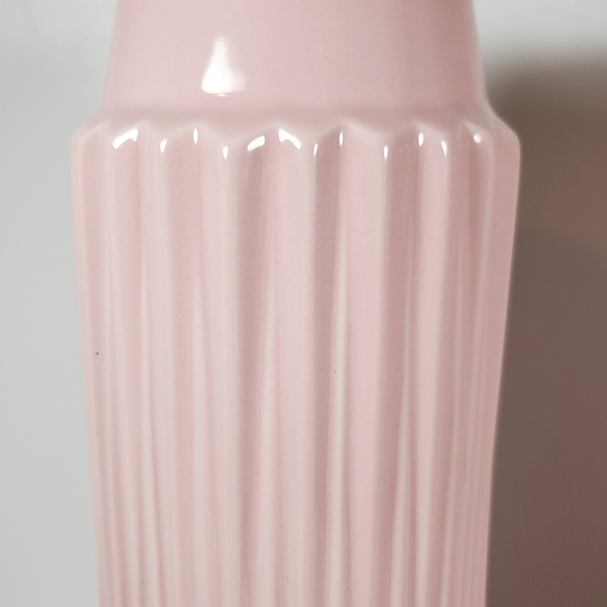 Blush pink ribbled ceramic vase zoomed in showing texture