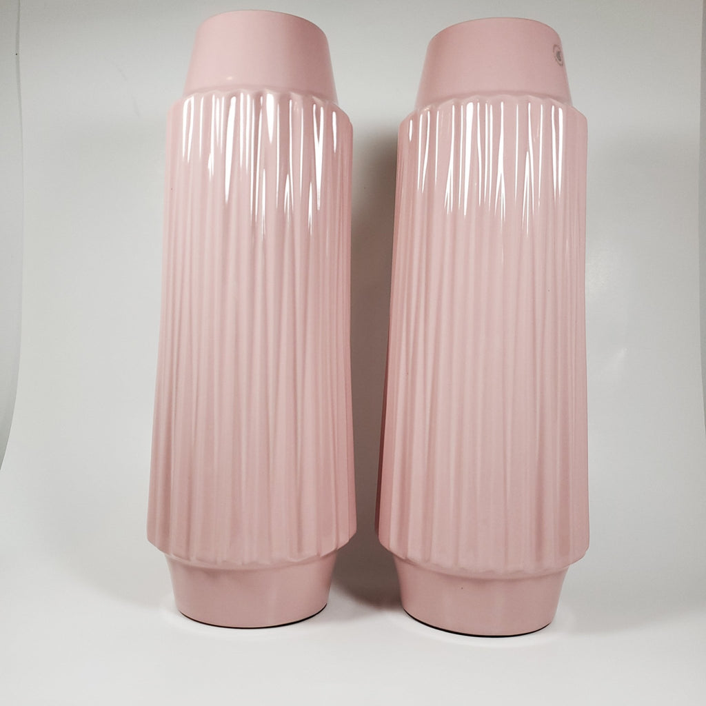 Blush pink ribbled ceramic vase showing pair