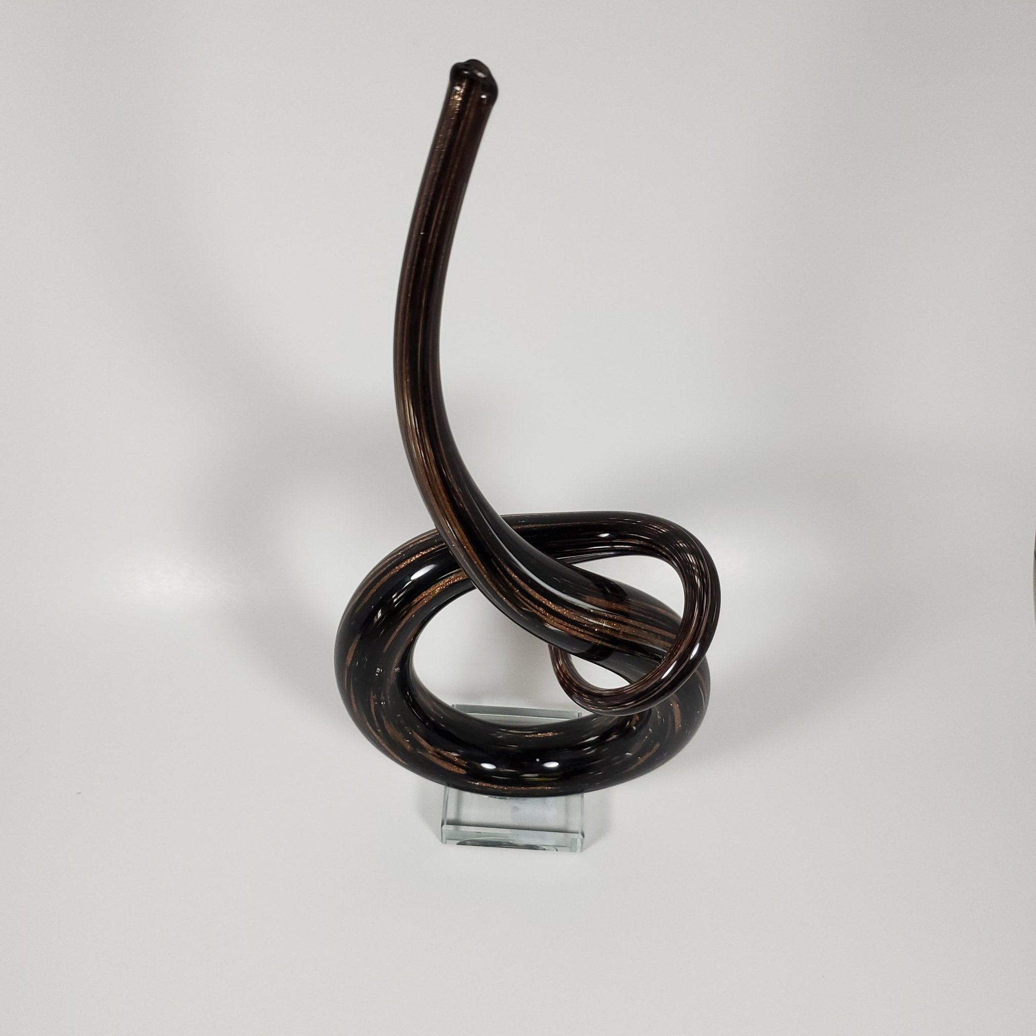 Brown and black accent piece angled top view