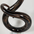 Brown and black accent piece top view zoomed in