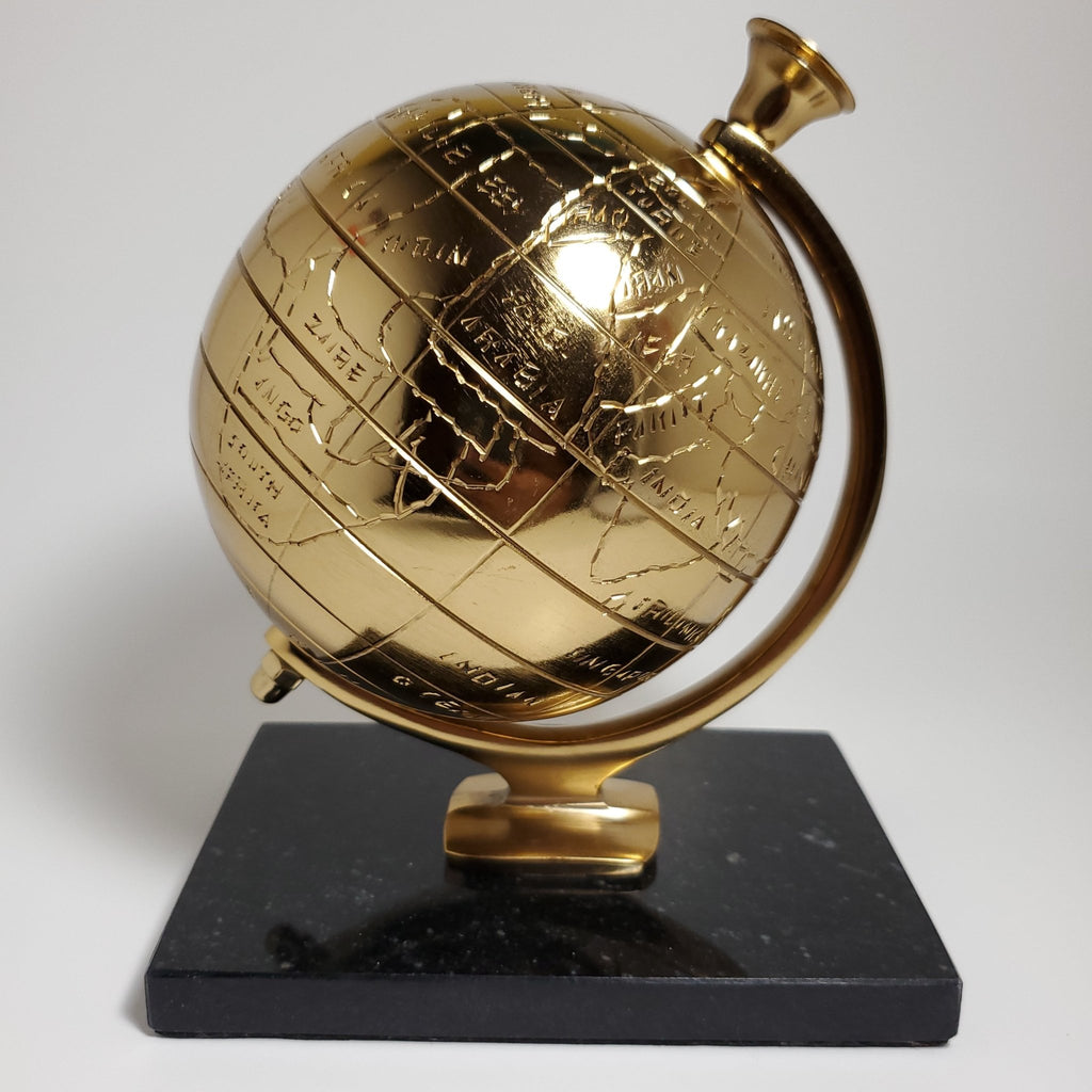 Gold decorative globe with black granite base front view