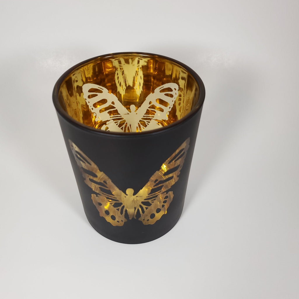 Luxury Matte Black and Gold Butterfly Glass Candle Jar angled view