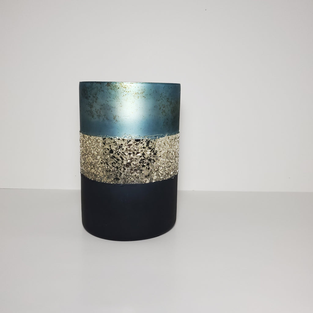 Two-toned blue and gold glass candle holder for elegant home décor distant view