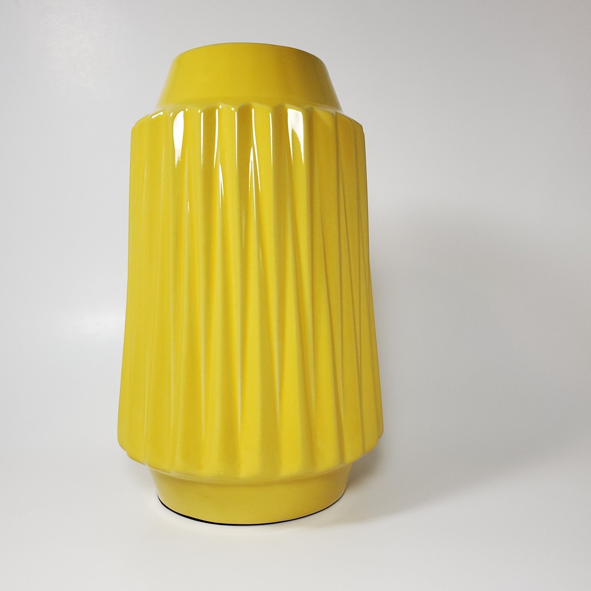 Sunshine yellow ribbed ceramic vase front view