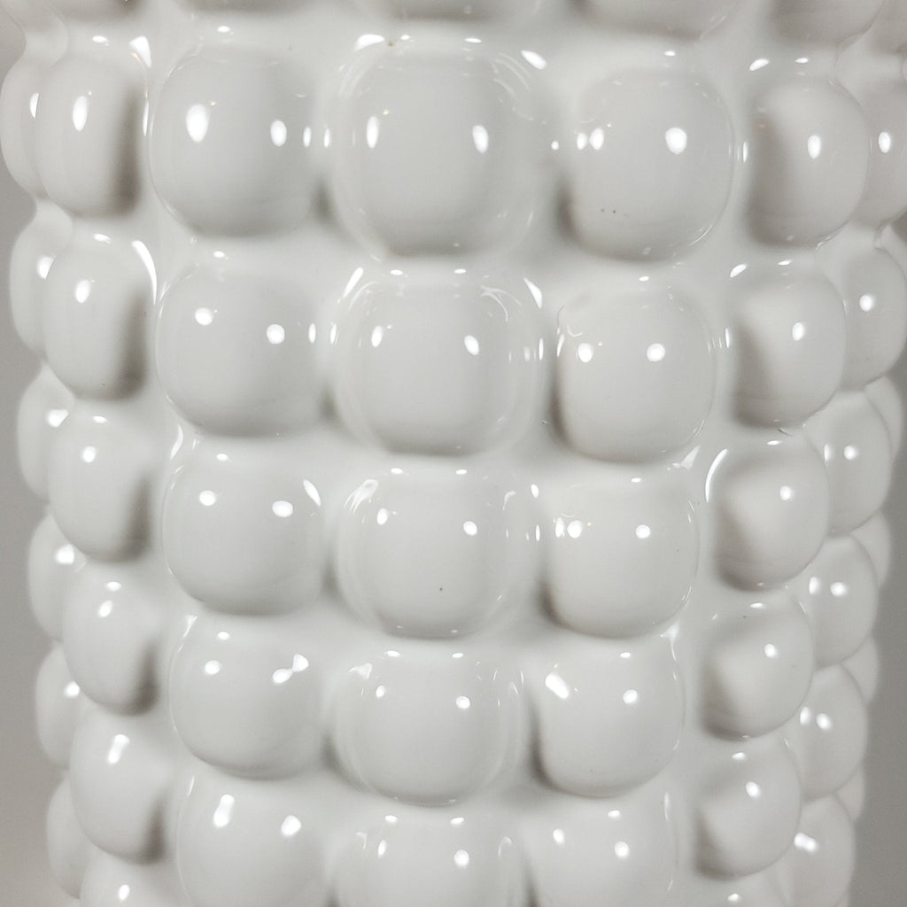 White bubble ceramic vase zoomed in showing texture